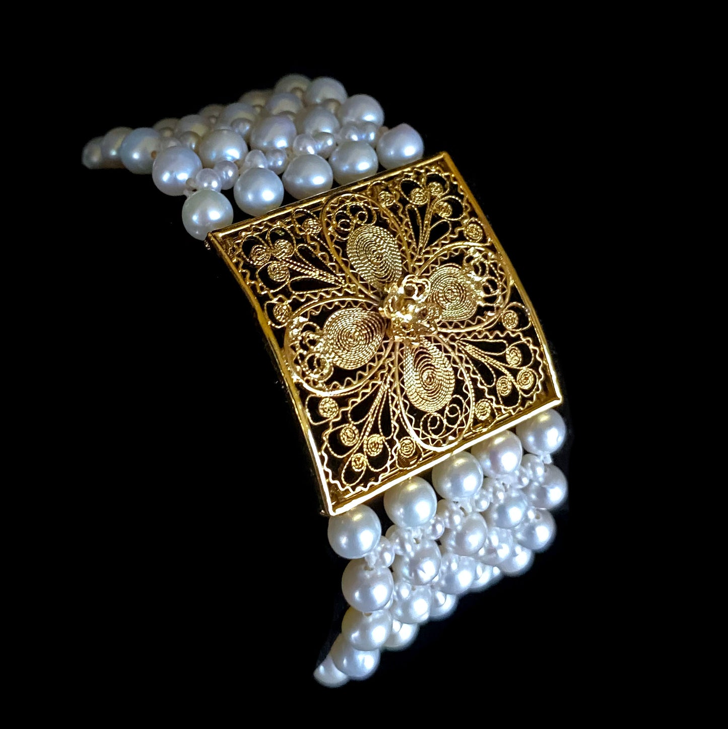 Pearl Woven Bracelet with 18k Yellow Gold Floral Centerpiece