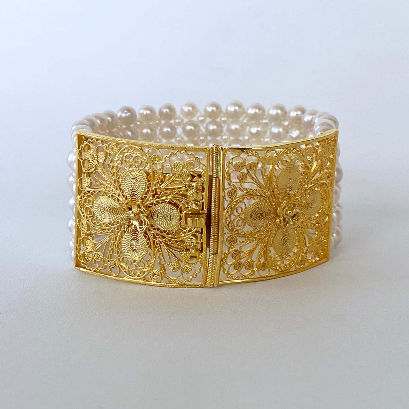 Woven Pearl Bracelet with 18k Yellow Gold Plated Floral Clasp