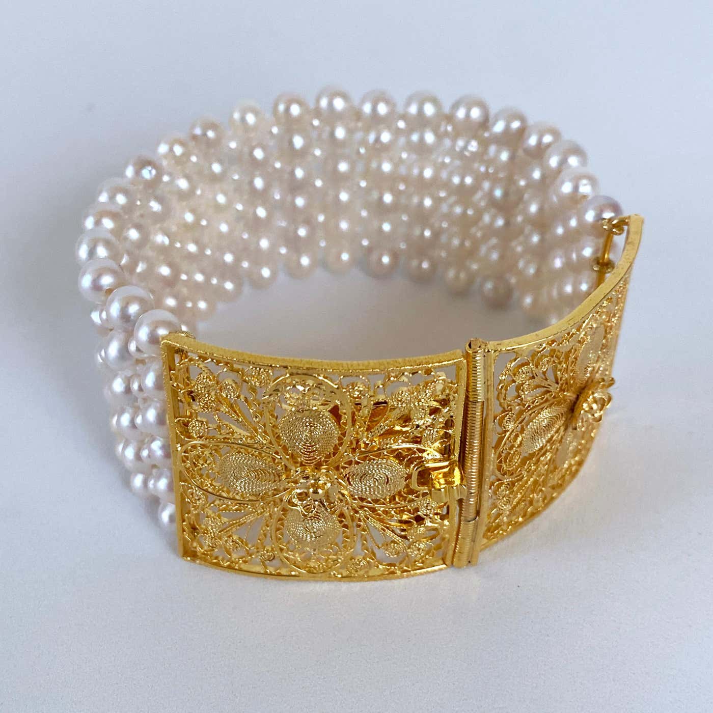 Woven Pearl Bracelet with 18k Yellow Gold Plated Floral Clasp