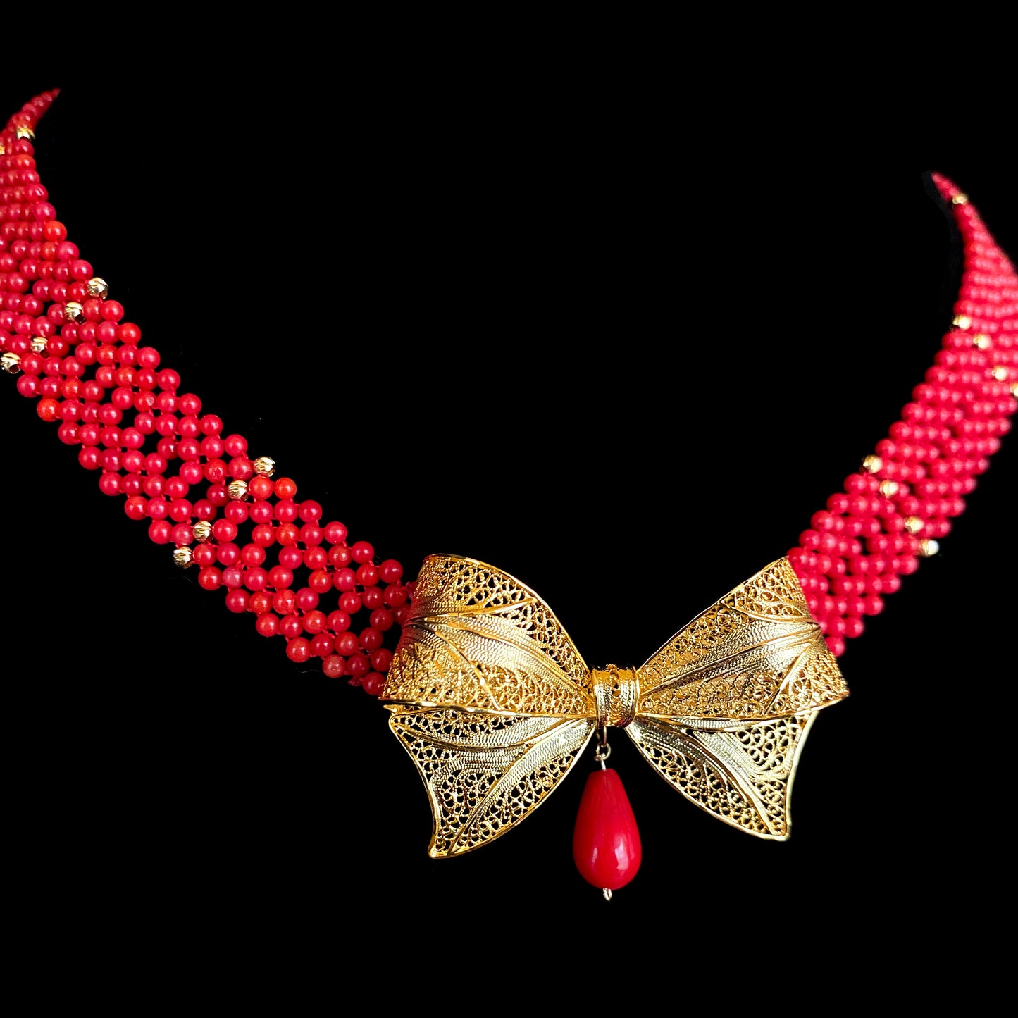 Coral Woven Necklace with 18k Plated Bowtie Centerpiece & Detailings