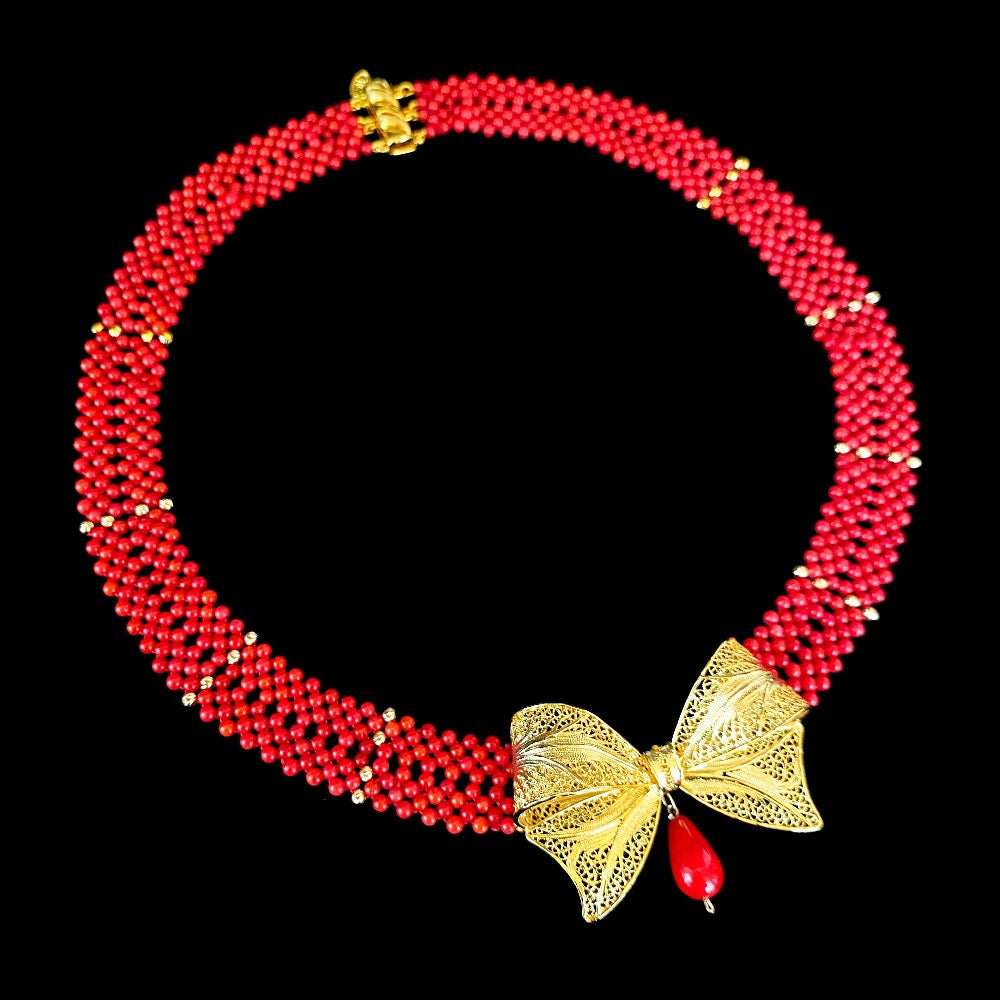Coral Woven Necklace with 18k Plated Bowtie Centerpiece & Detailings