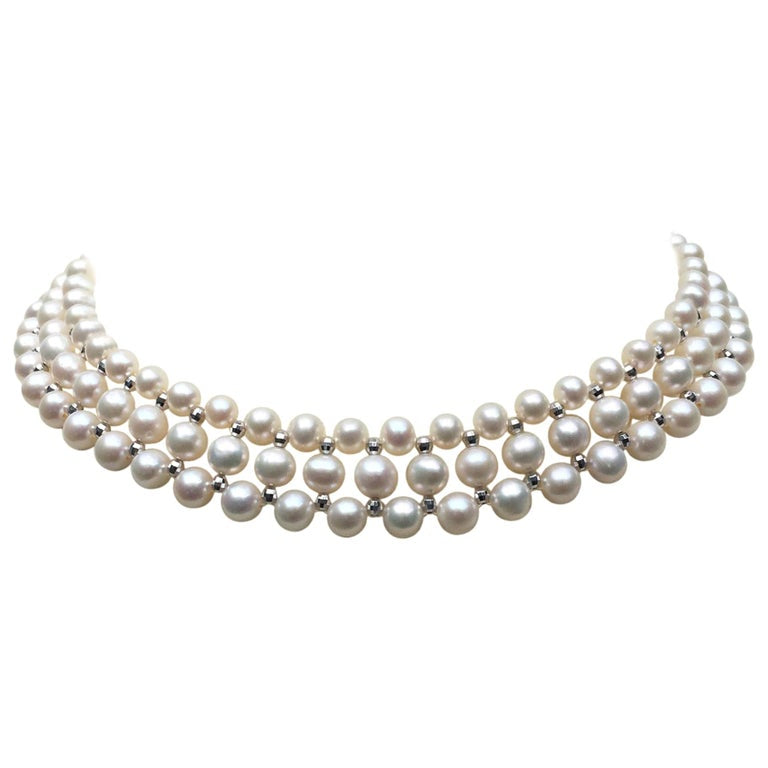 Woven Pearl Necklace with 14 Karat Gold Faceted Beads and Clasp