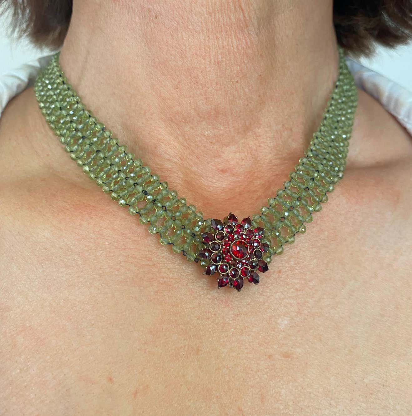 Woven Peridot Necklace with 14K Yellow Gold Clasp & Garnet Brooch