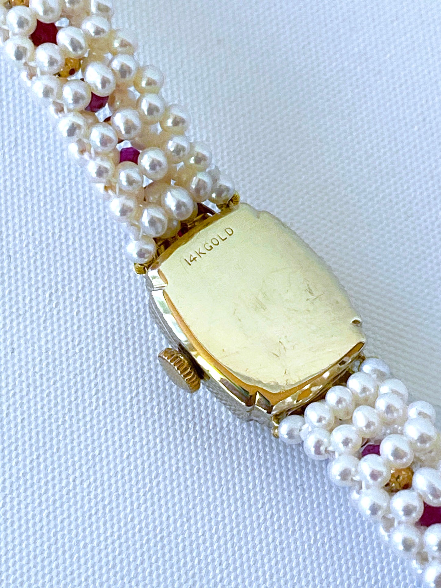 Vintage 14k Yellow Gold Watch with Woven Pearl, Ruby Band & Gold Clasp