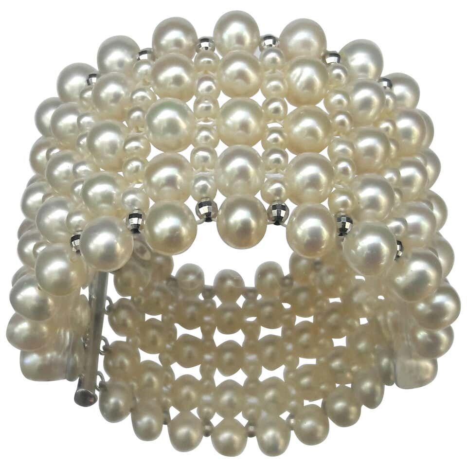 Multi Strand Intricately Woven Pearl Bracelet with Rhodium Silver Clasp