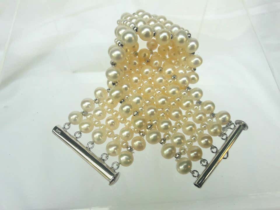 Multi Strand Intricately Woven Pearl Bracelet with Rhodium Silver Clasp