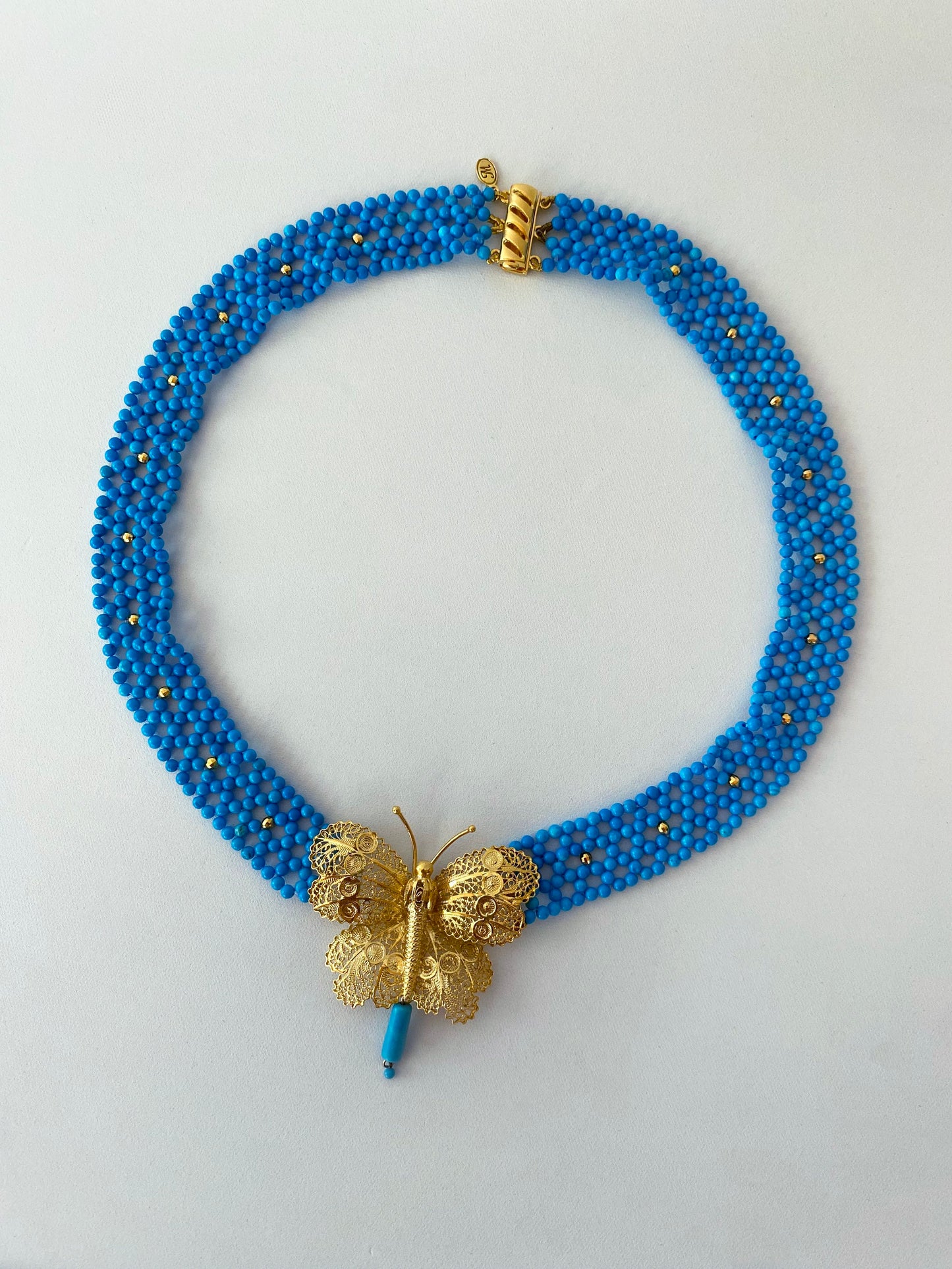 Turquoise Woven Necklace with Yellow Gold Butterfly Centerpiece