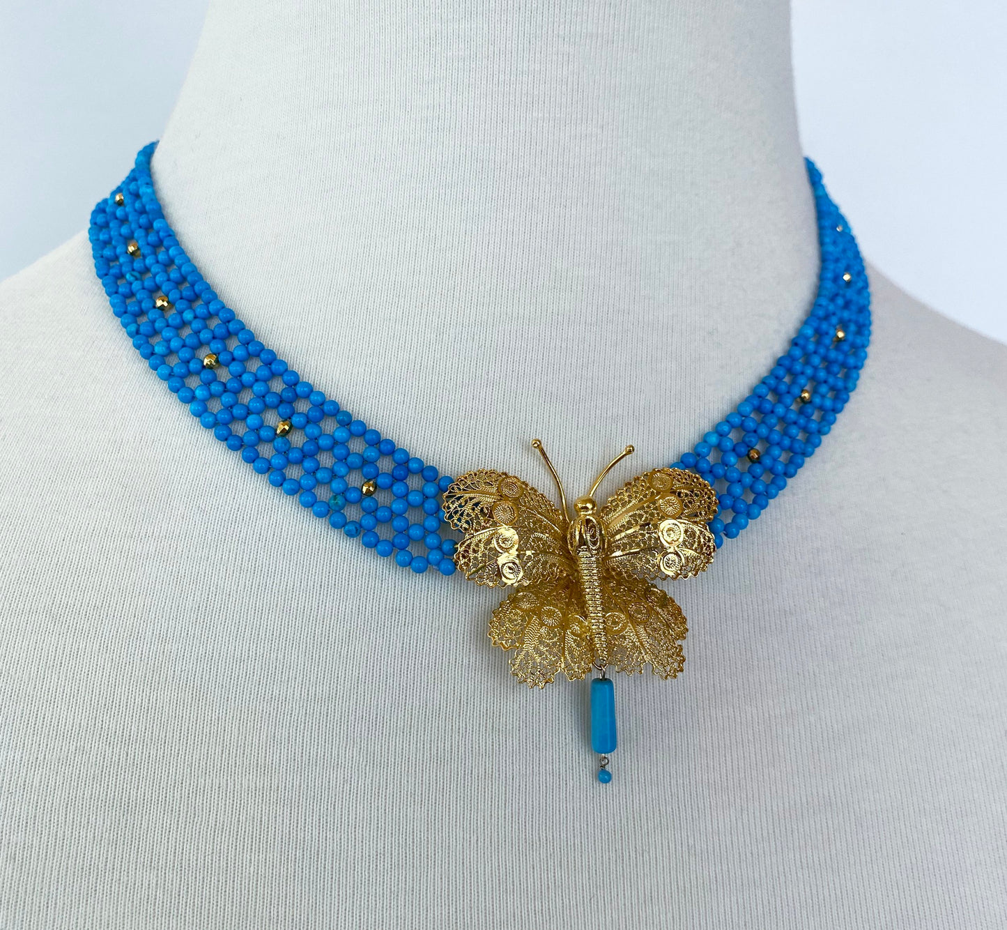 Turquoise Woven Necklace with Yellow Gold Butterfly Centerpiece