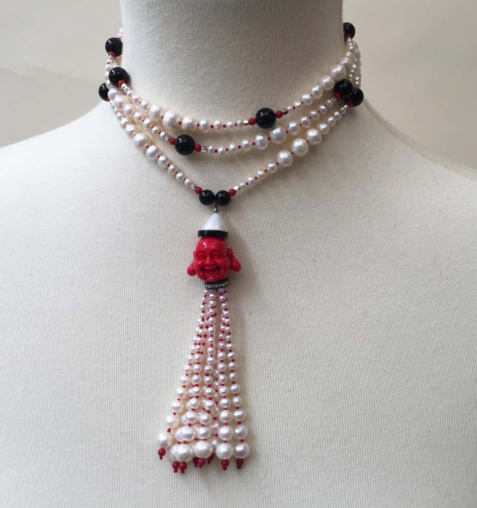 White Pearl, Coral, Onyx & Silver Necklace with Coral Buddha Tassel