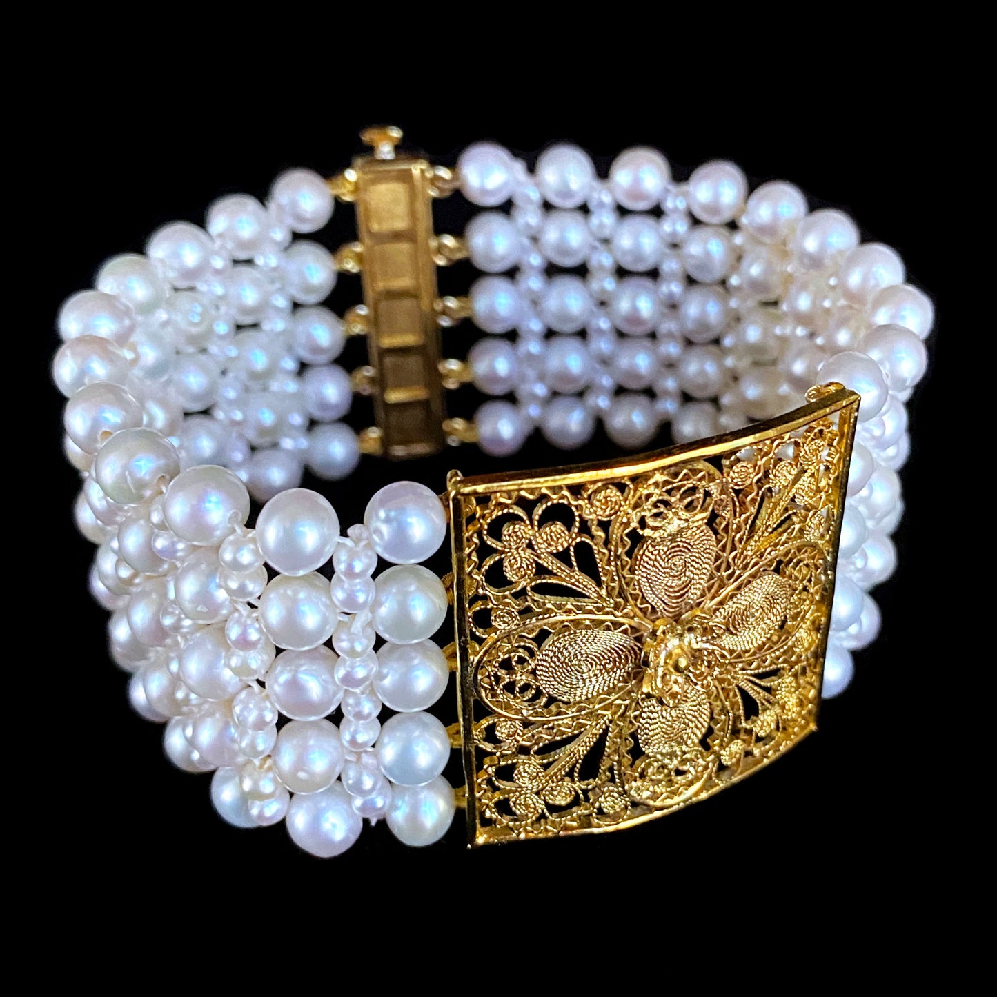 Pearl Woven Bracelet with 18k Yellow Gold Floral Centerpiece