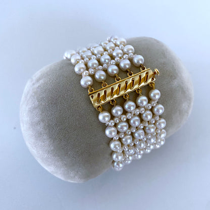 Pearl Woven Bracelet with 18k Yellow Gold Floral Centerpiece