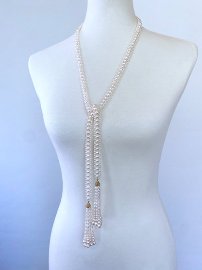 Pearl Sautoir with 14 Karat Gold and Diamond Cup and Pearl Tassels