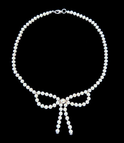 Pearl Necklace with Bow Centerpiece & Rhodium Clasp