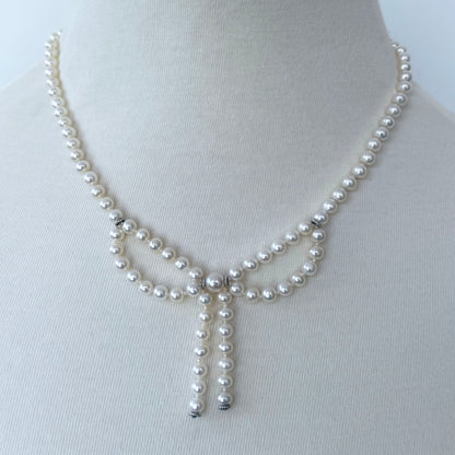 Pearl Necklace with Bow Centerpiece & Rhodium Clasp