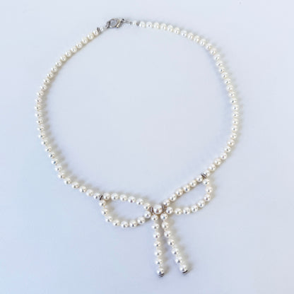 Pearl Necklace with Bow Centerpiece & Rhodium Clasp