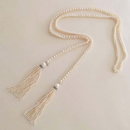 Intricately Woven Pearl Sautoir with Pearl Tassels Diamond roundels