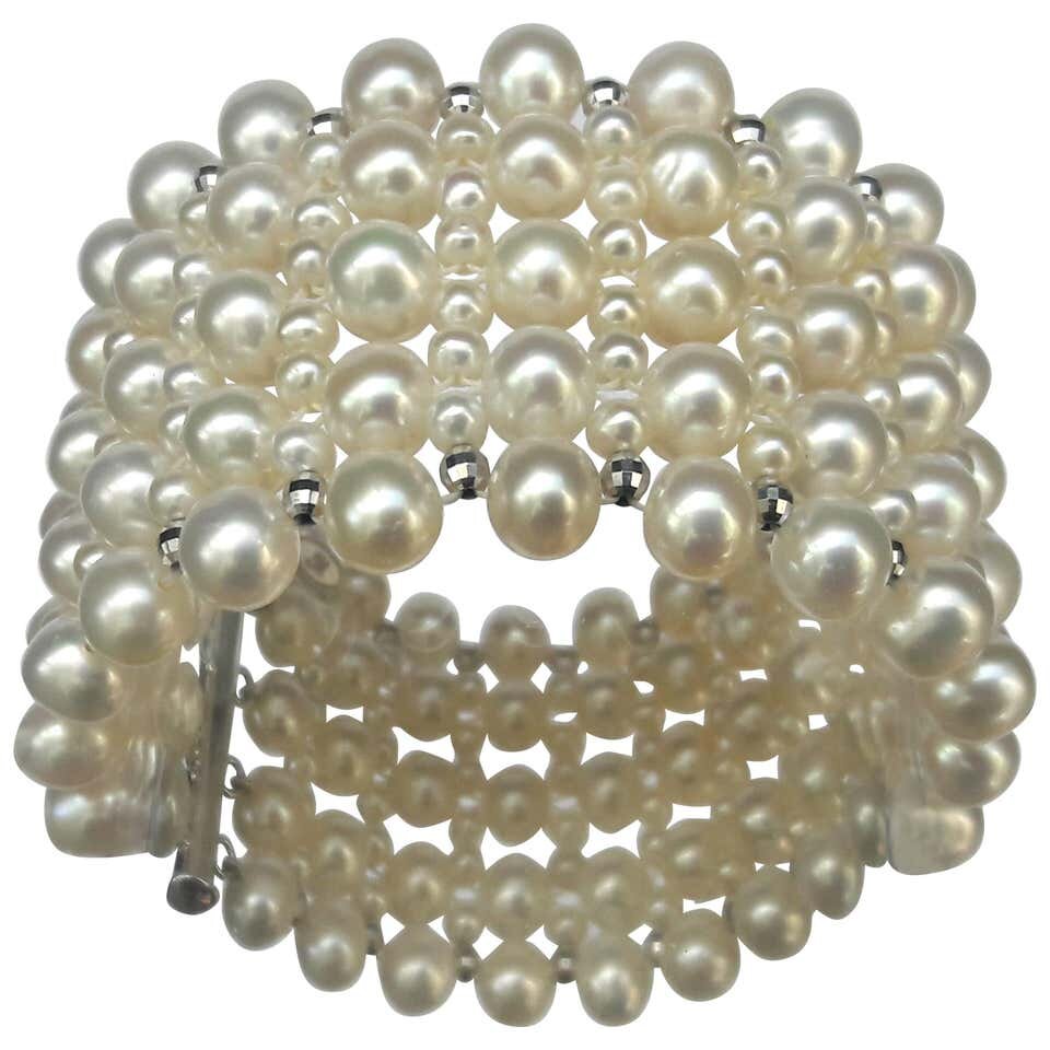 Multi Strand Intricately Woven Pearl Bracelet with Rhodium Silver Clasp