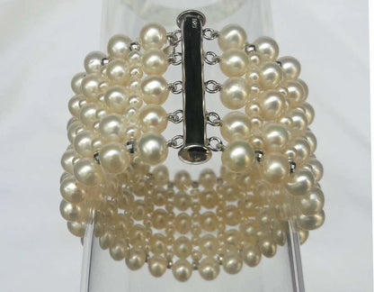 Multi Strand Intricately Woven Pearl Bracelet with Rhodium Silver Clasp