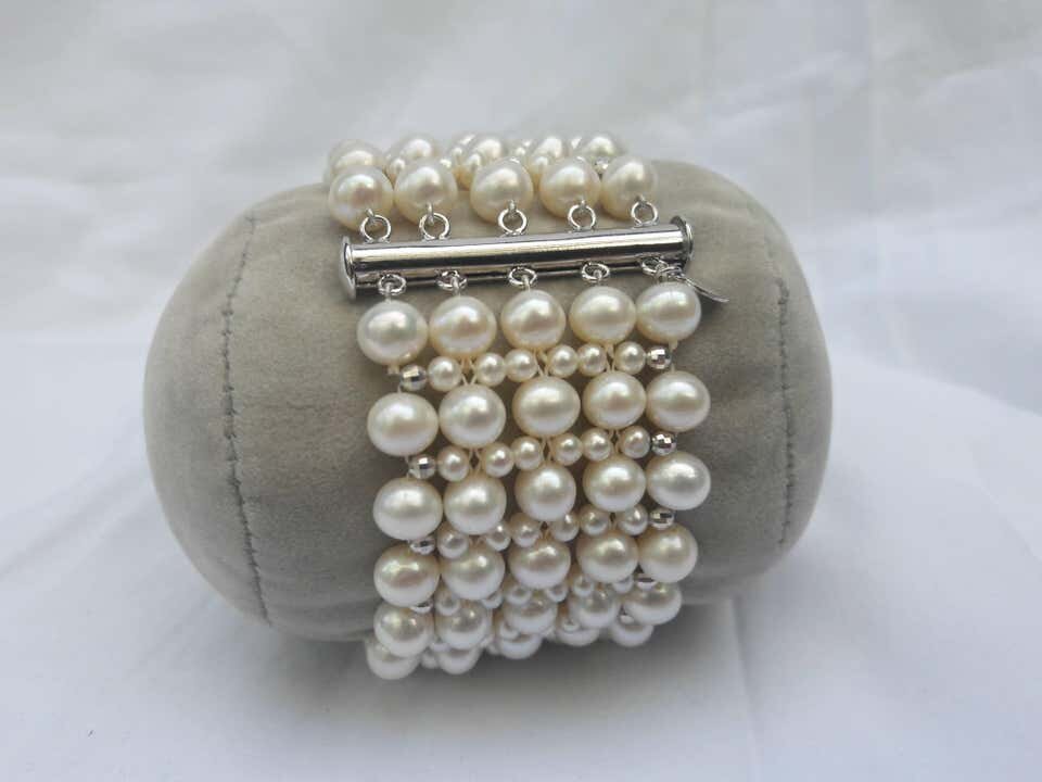 Multi Strand Intricately Woven Pearl Bracelet with Rhodium Silver Clasp