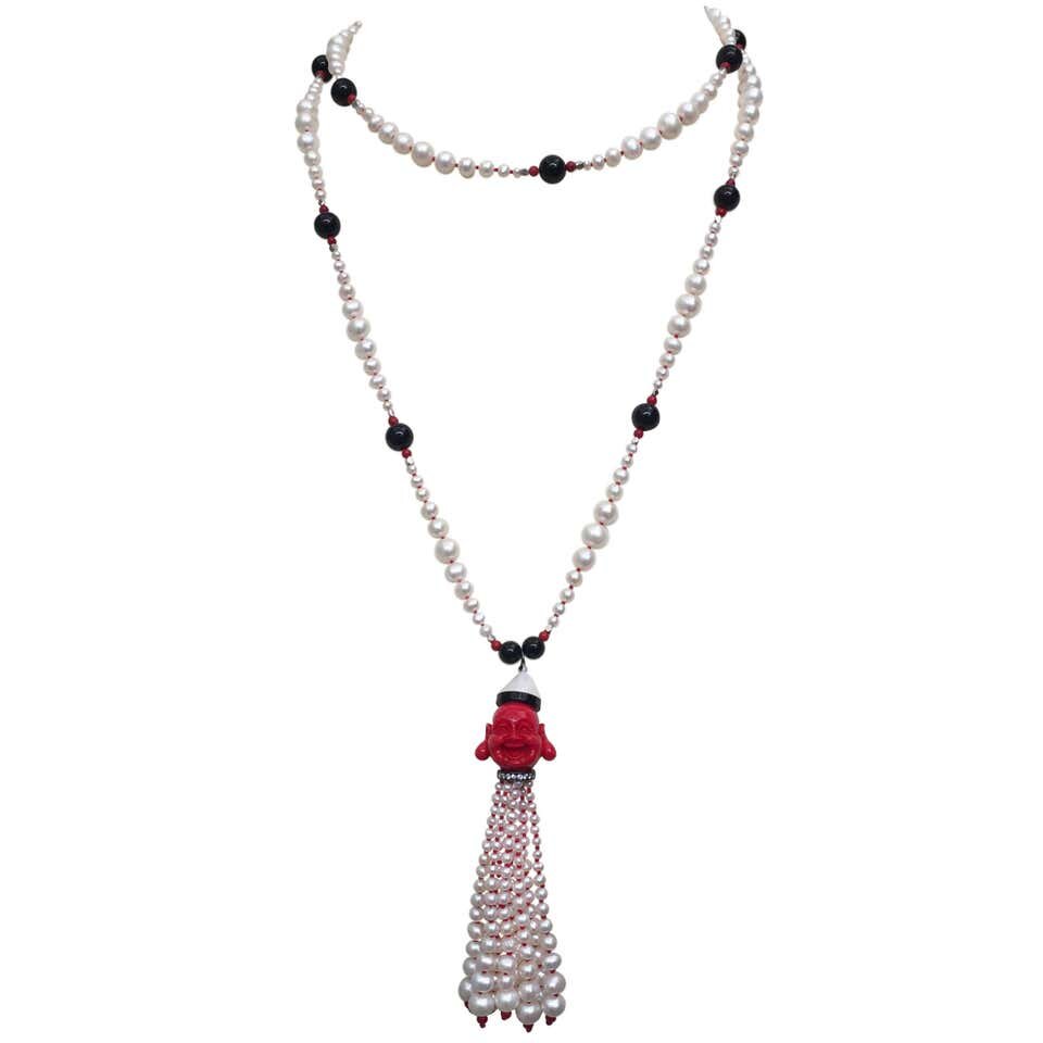 White Pearl, Coral, Onyx & Silver Necklace with Coral Buddha Tassel