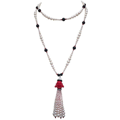 White Pearl, Coral, Onyx & Silver Necklace with Coral Buddha Tassel